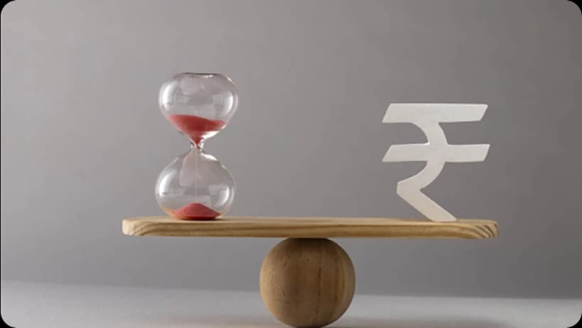 Hourglass and Indian Rupee symbol balanced on a seesaw, representing time and money.